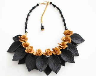 black leaves with gold flowers